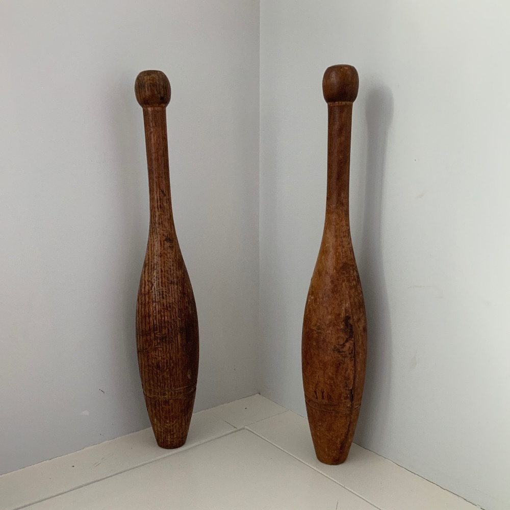 Antique juggling clubs